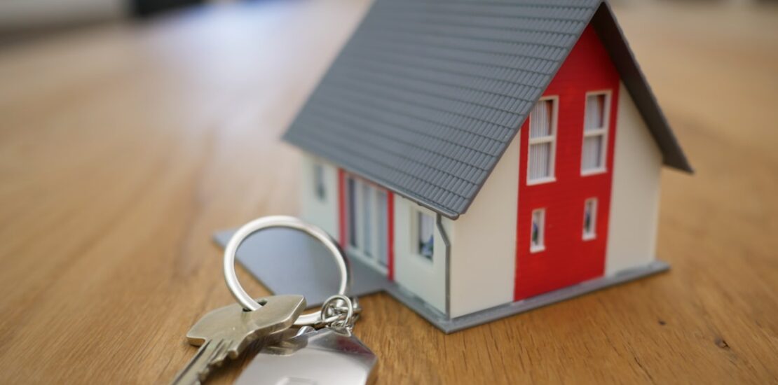 First-time home buyer receiving house keys in the GTA