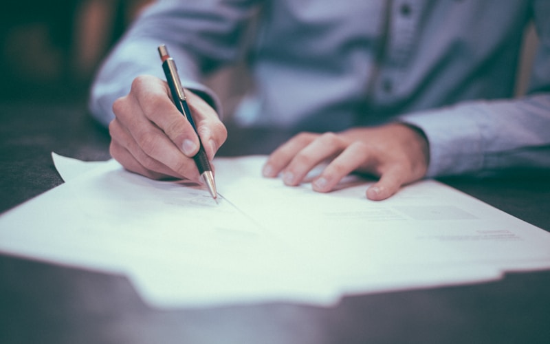 GTA homeowner reviewing mortgage renewal documents with a broker